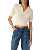 Steve Madden Lark Sweater Top in cream open-knit crochet with polo collar and short sleeves, worn with blue jeans, front view.