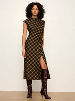 Sanctuary Autumn Edit Dress in Autumn Goldie Plaid, black and gold diagonal plaid midi dress with side ruching and slit, worn with brown knee-high boots