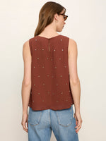 Sanctuary Margo Embellished Shell Top in Burnt Cocoa, back view on model, sleeveless with scattered metal studs and keyhole closure