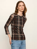 Sanctuary Mesh 3/4 Sleeve Top in Cinder Plaid — dark black, red, and beige plaid pattern, crew neck, worn by model with jeans