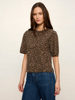 Sanctuary Perfect Sweater Tee in Le Cat leopard print, short puff sleeves, crew neck, worn with blue jeans, front view