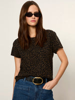 Sanctuary The Perfect Tee in Kalamata Leo leopard print, worn by model with jeans and black belt, front view