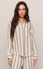 Z SUPPLY The Perfect Striped Button Up in Light Toffee — model wearing tan and cream striped linen shirt with collar and chest pocket