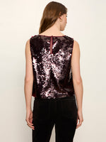 Sanctuary Desired Pailette Shell in Bordeaux — back view on model, sleeveless sequin top with keyhole closure and deep wine-rose tones