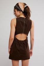 Free People Atlas Suede Mini dress in chocolate brown, back view on model showing open-back cutout detail and back zipper
