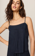 Z SUPPLY Lille Embroidered Woven Tank in Eclipse navy, featuring spaghetti straps, floral embroidery, and lace trim detail, worn by model