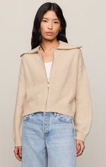 Z SUPPLY Silverlake Cardigan in Chalk — model wearing cream zip-up knit sweater with wide collar and ribbed detailing, paired with light wash jeans