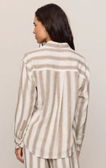 Z Supply The Perfect Striped Button Up in Light Toffee, back view on model showing tan and white vertical stripes and relaxed fit