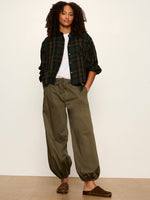 Sanctuary Autumn Edit Flannel in Forest Plaid — dark green tartan oversized button-up shirt worn open over white tee, front view on model