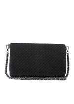 Haute Shore Lexi Woven Crossbody in Jet Black — back view of black woven textured flap bag with gunmetal chain strap