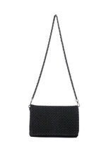 Haute Shore Lexi Woven Crossbody in Jet Black — woven textured clutch with long gunmetal chain strap, front view on white background.