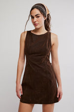 Free People Atlas Suede Mini dress in chocolate brown, sleeveless with round neck, worn by model with headband, front view