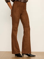 Sanctuary Sashay Legging in Cocoa Powder — back view, brown suede flare-leg pants on model with black heels and plaid shirt