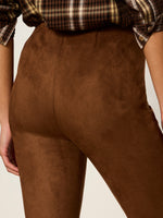 Sanctuary Sashay Legging in Cocoa Powder — close-up back view of brown faux suede leggings worn with plaid shirt