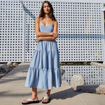 BY TOGETHER Woven Striped Sleeveless Maxi Dress in blue and white seersucker, tiered skirt, worn by model, front view