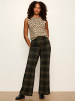 Sanctuary Relay Pull On Pant in Kalamata Plaid, dark green plaid wide-leg trousers worn by model with sleeveless top and loafers, front view.