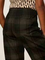 Sanctuary Relay Pull On Pant in Kalamata Plaid, close-up back view showing dark green and black tartan fabric with rear pocket detail