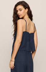 Z SUPPLY Lille Embroidered Woven Tank in Eclipse navy, back view on model showing spaghetti straps, lace trim, and button closure