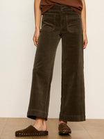 Sanctuary Chelsea Wide Leg corduroy pants in olive Kalamata, front view with patch pockets, worn with brown studded clogs