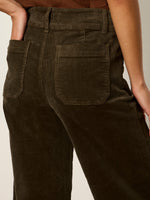 Sanctuary Chelsea Wide Leg corduroy pants in Kalamata olive green, back view close-up showing patch pocket detail