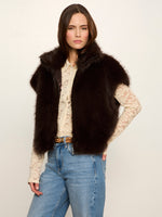 Sanctuary Silky Fur Vest in Espresso Martini dark brown, worn open over cream lace top with jeans, front view on model