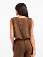 Sadie and Sage Sepia Sky Bubble Top in Bronze Olive, back view on model, sleeveless crinkled fabric with elastic waist