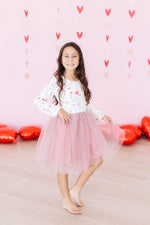 Mila Better Together L/S Tutu Dress — white long-sleeve heart-print top with pink tulle skirt, front view on smiling girl