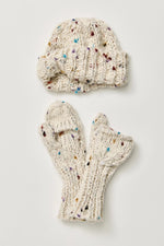 Free People Speckled Cph Set flat lay showing ivory chunky knit beanie and convertible mittens with multicolor fleck detail