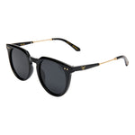 I-SEA Ella sunglasses in black with smoke polarized lenses, gold metal temple arms, and gold chevron logo detail, three-quarter view