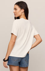 Z SUPPLY La Playa Boyfriend Tee in Sea Salt — back view on model with denim shorts, short sleeves, relaxed fit