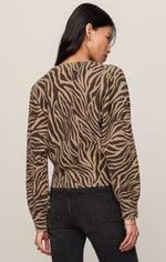 Z SUPPLY All The Wild Cardigan in dark chocolate zebra print, back view on model paired with black jeans