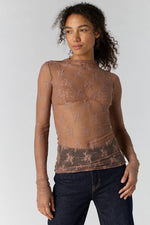Free People Lady Lux Layering Top in Chocolate Malt — sheer floral lace mesh long-sleeve top, front view on model with dark jeans