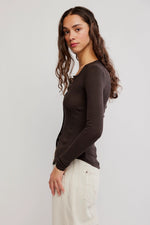 Free People Going Places Cardi in Deep Fudge dark brown waffle-knit, side view on model with snap button front and long sleeves