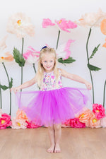 Mila & Rose Tank Tutu Dress in Purple Perfection worn by blonde girl with floral bodice and purple tulle skirt