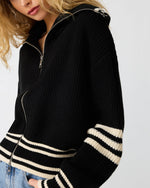 Steve Madden Dara Sweater in black with cream stripes, full-zip knit cardigan with varsity-style sleeve detail, worn by model