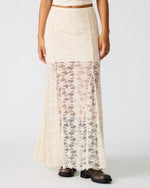 Steve Madden Mirabel Skirt in cream lace featuring full-length design with sheer bottom half, worn by model