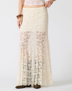 STEVE MADDEN Mirabel Skirt in cream lace maxi length with sheer floral pattern, worn by model with brown sandals