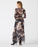 Steve Madden Sandy Knit Top in Moon Shadow print, back view on model styled with matching maxi skirt and black heeled boots