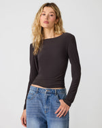 Steve Madden Sandy Knit Top in Dark Espresso — fitted long-sleeve crop top with boat neckline, worn by model with blue jeans, front view