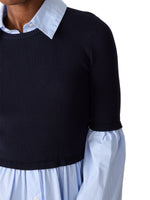Steve Madden Lenny Knit Top in navy ribbed knit layered over blue striped shirt dress, close-up front view on model
