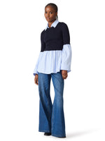 Steve Madden Lenny Knit Top in navy and light blue mixed-media style with collar detail, worn with wide-leg jeans, front angle view.