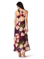 Steve Madden Rylen Dress back view on model, floral maxi dress with criss-cross open back, dark purple blurry floral print