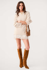 Z SUPPLY Meadow Muse Lace Mini Dress in Frosted Pearl, worn by model with cream sweater, brown suede boots, and crossbody bag