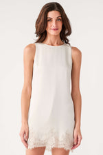 Z Supply Meadow Muse Lace Mini Dress in Frosted Pearl, sleeveless shift silhouette with lace hem trim, front view on model