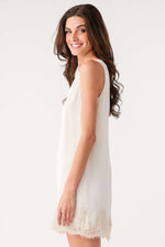 Z SUPPLY Meadow Muse Lace Mini Dress in Frosted Pearl — side view on model, sleeveless shift silhouette with delicate lace hem trim