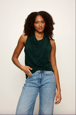 Sanctuary Nora Draped Tank in forest green with cowl neck and wrap front, styled with light wash wide-leg jeans on a model