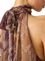 Steve Madden Alexane Top in bronze snake print, close-up back detail showing halter neck tie and open back on model