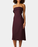 Steve Madden Roslynn Dress in deep burgundy-chocolate, strapless fold-over bodice, midi length, model front view