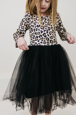 Mila Wild One L/S Tutu Dress with leopard print bodice, long sleeves, and flowy black tulle skirt, worn by a young girl