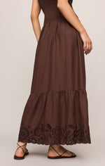 Z SUPPLY Esti Embroidered Maxi Dress in Chocolate Cherry, side view showing tiered skirt with floral cutwork hem and smocked waist.